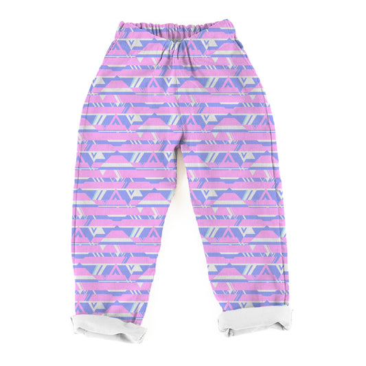 Handmade pink and purple geometric patterned denim trousers with elasticated waistband and rolled legs, made in the UK.